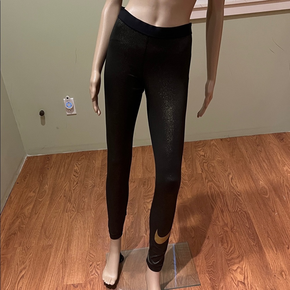 Nike Pro Black High-Rise Shimmery Leggings with Gold Swish Logo
